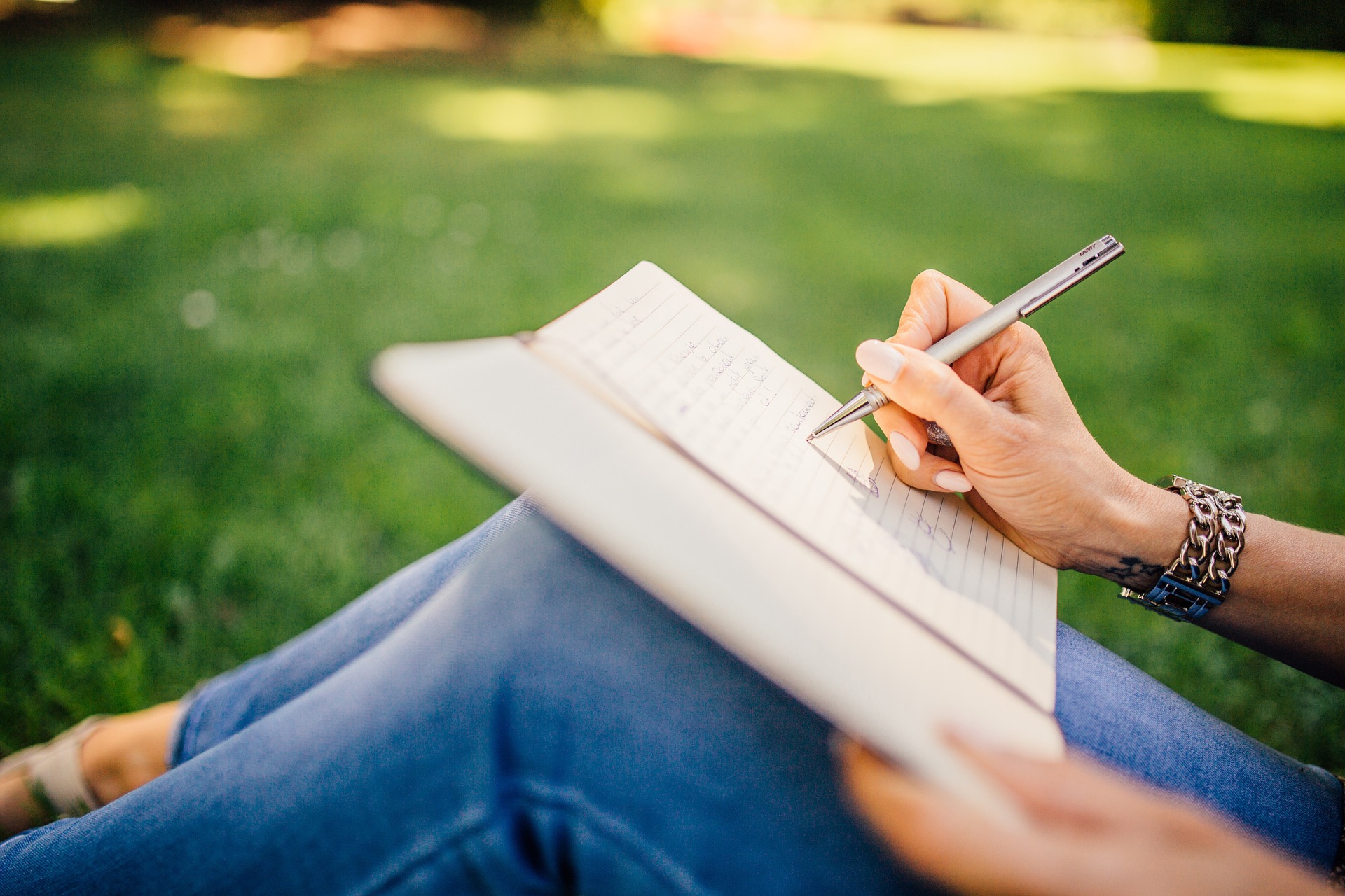 Woman writing in notebook